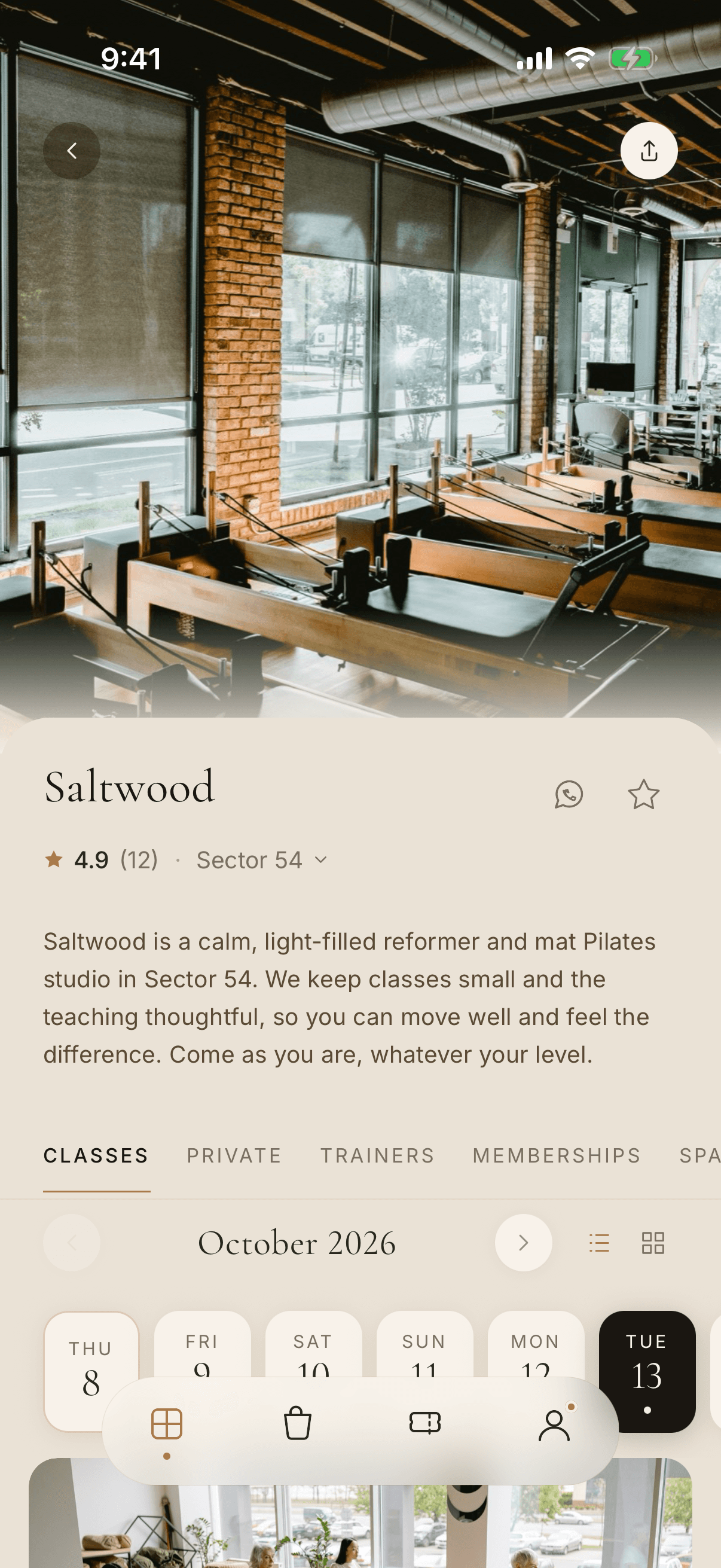 Saltwood studio page in the MEHMBR app: a photo of the studio's reformer room, the name, a 4.9 rating from 12 reviews, the description, class tabs and a date strip with Tue 13 selected.